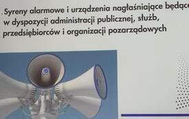 Zdjęcie przedstawia grupe ludzi biorącą udział w szkoleniu